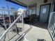Comfortable porch with outdoor seating and a fire pit table, perfect for enjoying the pleasant surroundings at 2070 W Klamath Ave, Apache Junction, AZ 85119