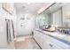 Contemporary bathroom with white marble shower, double sinks, and modern fixtures at 20906 E Macaw Dr, Queen Creek, AZ 85142