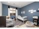 Nicely appointed bedroom with twin beds and neutral color palette at 20906 E Macaw Dr, Queen Creek, AZ 85142