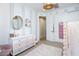 bedroom features a dresser with decorative accents and closet with functional storage system at 20906 E Macaw Dr, Queen Creek, AZ 85142