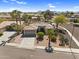 Stunning aerial view showcasing a home with desert landscaping and a tile roof in a well-planned community at 21141 E Stirrup St, Queen Creek, AZ 85142