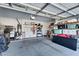 Spacious garage with ample storage space and overhead lighting, ready for organization at 21141 E Stirrup St, Queen Creek, AZ 85142