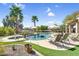 Outdoor oasis featuring a pool with a spa and a seating area perfect for entertaining at 21141 E Stirrup St, Queen Creek, AZ 85142