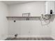 A simple laundry room with essential hookups and space for storage at 2161 E Corona Ave, Phoenix, AZ 85040