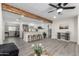 Inviting open-concept living area with a kitchen island, sleek appliances, and comfortable seating at 2161 E Corona Ave, Phoenix, AZ 85040