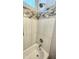 Bathroom shower and tub with white and beige tile at 2544 W Pumpkin Ridge Dr, Anthem, AZ 85086