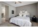 Comfortable bedroom featuring soft, neutral tones, and carpet flooring at 2544 W Pumpkin Ridge Dr, Anthem, AZ 85086