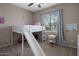Cozy bedroom with unique bed with a slide and plenty of natural light at 2544 W Pumpkin Ridge Dr, Anthem, AZ 85086