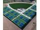 Aerial view of multiple pickleball courts with blue and green surfaces, surrounded by landscaping at 2544 W Pumpkin Ridge Dr, Anthem, AZ 85086