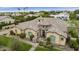 A stunning aerial view of a custom home with desert landscaping and a tile roof at 3314 E Kael St, Mesa, AZ 85213
