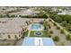 Beautiful backyard with a sparkling pool, jacuzzi, and covered patio offers a serene escape for relaxation and outdoor dining at 3314 E Kael St, Mesa, AZ 85213