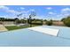A sprawling backyard boasts a sports court, trampoline, and pool, providing endless options for outdoor recreation and enjoyment at 3314 E Kael St, Mesa, AZ 85213