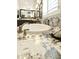 Bright bathroom featuring a white countertop, framed mirror, decorative flowers, and bronze fixtures at 3314 E Kael St, Mesa, AZ 85213