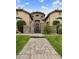 Beautiful home with a gated front entrance and stone accents at 3314 E Kael St, Mesa, AZ 85213