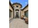 Welcoming front porch with cozy seating and stylish decor at 3314 E Kael St, Mesa, AZ 85213