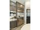 Kitchen featuring stainless steel appliances, custom cabinets, and a built-in microwave at 3314 E Kael St, Mesa, AZ 85213