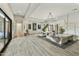 Bright and airy living room with seamless transitions to other rooms and outdoor spaces at 3314 E Kael St, Mesa, AZ 85213
