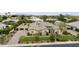 An attractive home with a desert landscape, tile roof, and lush greenery from a street view at 3314 E Kael St, Mesa, AZ 85213