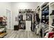Spacious walk-in closet with shelves, clothing racks, and plenty of storage space at 3314 E Kael St, Mesa, AZ 85213