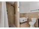 Elegant bathroom featuring a tiled shower, vintage clawfoot tub with decorative accents, and a modern toilet at 3397 E Derringer Way, Gilbert, AZ 85297