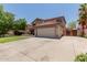 Two-story home with a two-car garage and a driveway leading to the street at 3397 E Derringer Way, Gilbert, AZ 85297