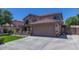 Charming two-story home with a well-manicured lawn and inviting front porch at 3397 E Derringer Way, Gilbert, AZ 85297