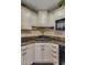 Kitchen area showcasing granite countertops and white cabinets at 3397 E Derringer Way, Gilbert, AZ 85297