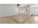 Open living room with tile flooring, decorative pattern, and ample natural light at 3397 E Derringer Way, Gilbert, AZ 85297