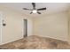 Bedroom featuring tile floors, closet, and natural light at 346 E Highland Ave, Phoenix, AZ 85012