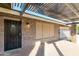 Charming front porch with wrought iron door detailing, stone accents, and a cozy welcoming ambiance at 346 E Highland Ave, Phoenix, AZ 85012