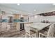 Open kitchen concept boasting a kitchen island with seating and stainless steel appliances at 346 E Highland Ave, Phoenix, AZ 85012