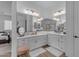 Spacious bathroom featuring double sinks, ample counter space, and modern lighting fixtures at 3502 E Hazeltine Way, Queen Creek, AZ 85142