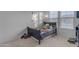 A cozy bedroom with Minecraft themed decor and plenty of natural light at 3502 E Hazeltine Way, Queen Creek, AZ 85142