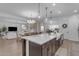 Bright, open-concept kitchen and living space with hardwood floors and modern decor at 3502 E Hazeltine Way, Queen Creek, AZ 85142
