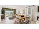 Open-concept living area features bright natural light, modern decor and seamless indoor-outdoor flow at 35540 N Breezy Ln, San Tan Valley, AZ 85140