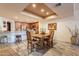 Charming dining area adjacent to the kitchen, featuring a stylish table and comfortable seating at 36601 N Mule Train Rd # B14, Carefree, AZ 85377