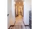 Hallway view looking through the home to a well-appointed bathroom at the end at 36601 N Mule Train Rd # B14, Carefree, AZ 85377