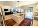 Bright open kitchen features an island with granite countertops and stainless steel appliances at 3811 N 64Th St, Scottsdale, AZ 85251