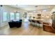 The kitchen features an island with bar seating, granite countertops, and stainless steel appliances at 3811 N 64Th St, Scottsdale, AZ 85251