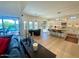 An open-concept floorplan connects the living room with the kitchen in this beautifully designed home at 3811 N 64Th St, Scottsdale, AZ 85251