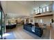 The airy floor plan features high ceilings, a view of the loft, and a kitchen with seating at 3811 N 64Th St, Scottsdale, AZ 85251