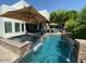 Enjoy the private pool and spa, perfect for relaxation and entertaining in your outdoor oasis at 3811 N 64Th St, Scottsdale, AZ 85251