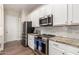 Well-equipped kitchen with stainless steel appliances and granite countertops at 4086 E Narrowleaf Dr, Gilbert, AZ 85298