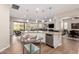 Spacious open concept kitchen island and easy access to indoor and outdoor living areas at 4086 E Narrowleaf Dr, Gilbert, AZ 85298