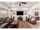 Comfortable living room with a ceiling fan, recessed lighting, and stylish furnishings at 4086 E Narrowleaf Dr, Gilbert, AZ 85298