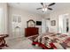 The main bedroom has neutral carpeted floors, access to the bathroom, and large dresser at 4086 E Narrowleaf Dr, Gilbert, AZ 85298