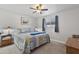 Comfortable bedroom with ceiling fan, picture window, and ample closet space at 445 S Omaha --, Mesa, AZ 85206