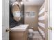 Modern bathroom features a vanity with a vessel sink and a neutral-toned shower curtain at 4539 N 9Th Ave, Phoenix, AZ 85013