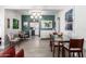 Open-concept dining room showcases modern lighting and seamless flow to the kitchen at 4539 N 9Th Ave, Phoenix, AZ 85013