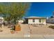 Charming single-story home enhanced by xeriscaping, mature tree, and a concrete walkway at 4539 N 9Th Ave, Phoenix, AZ 85013